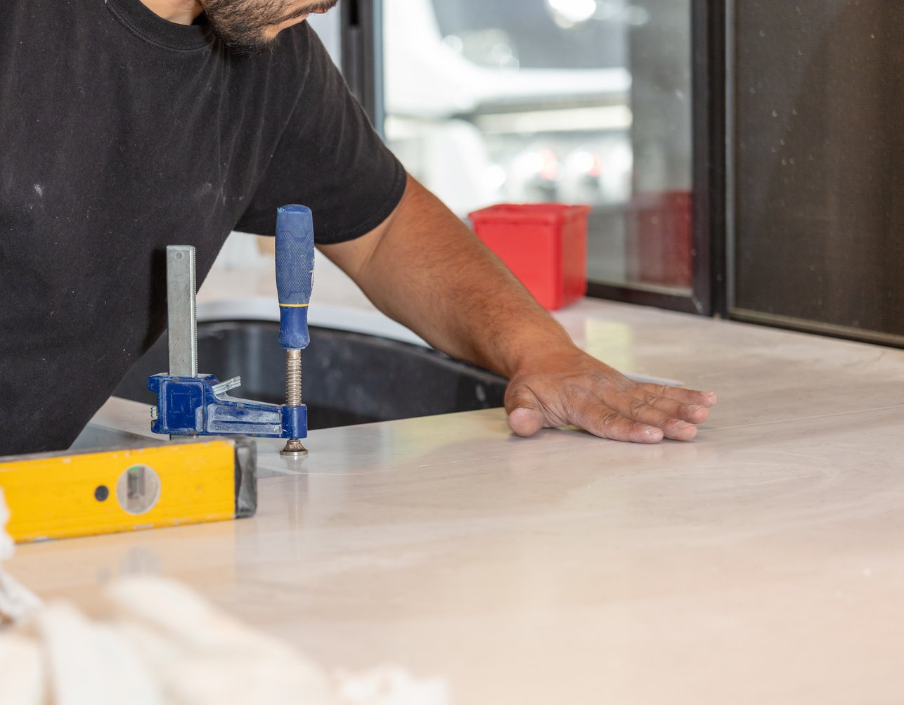 Installing kitchen countertops in home remodel